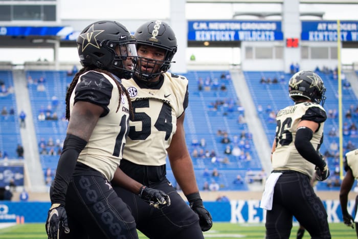 Vanderbilt Commodores wide receiver Chris Pierce Jr. (19) and offensive lineman Tyler Steen (54) celebrate after a touchdown during the second quarter against the Kentucky Wildcats at Kroger Field.